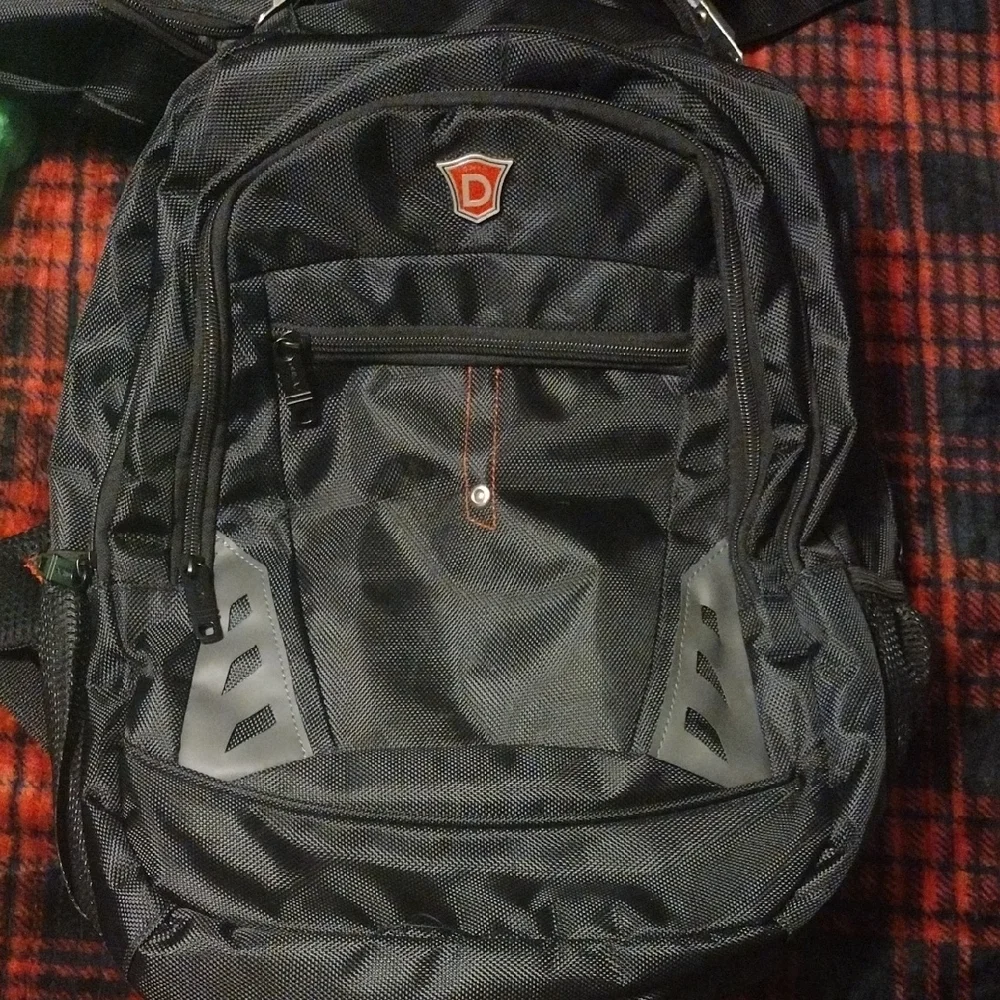 Sleek Black and Gray Backpackwith Laptop Or Tablet Compartment